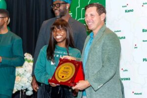 Emmanuella Samuel receiving Recognition Award from the Mayor of Brampton, Canada